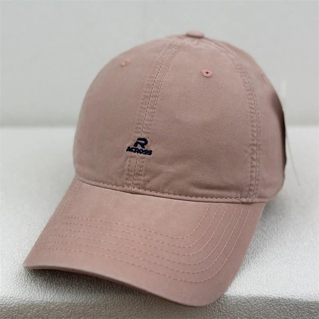 Pink baseball cap on the catalogue