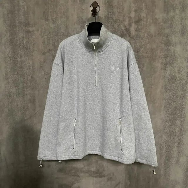 Grey half-zip sweatshirt on the catalogue