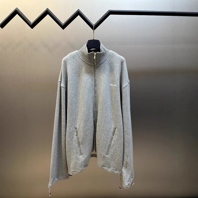 Grey zip-up track jacket on the catalogue