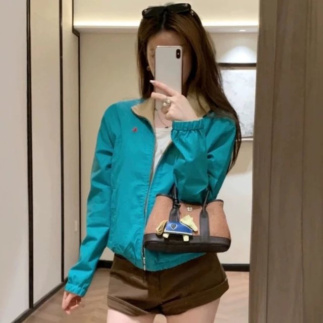 Teal bomber jacket outfit on the catalogue